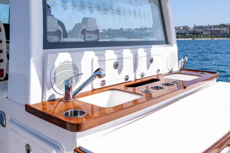  Yacht Photos Pics Luxury yacht HCB 53 Sueños 2020 with sleek outdoor kitchen and ocean view.