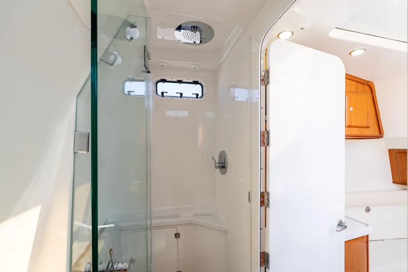  Yacht Photos Pics Luxurious bathroom interior of 2020 HCB 53 Sueños yacht with glass shower.