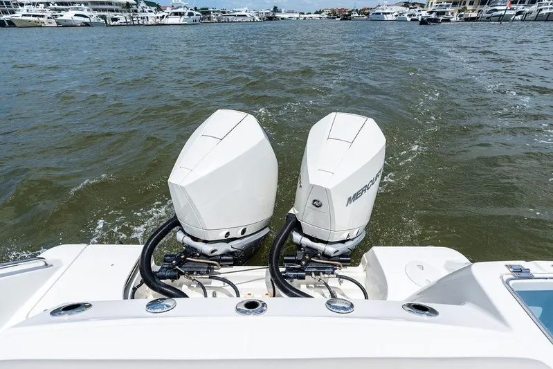  Yacht Photos Pics 2020 Boston Whaler 280 Outrage with dual Mercury outboard engines on water.