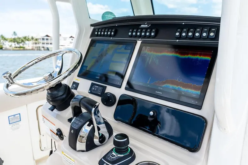  Yacht Photos Pics Control panel of a 2020 Boston Whaler 280 Outrage with advanced navigation displays.