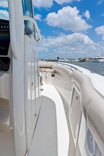  Yacht Photos Pics 2020 Boston Whaler 280 Outrage boat deck with ocean view and blue sky.