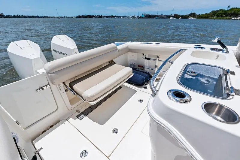  Yacht Photos Pics 2020 Boston Whaler 280 Outrage boat interior with seating and fishing amenities.