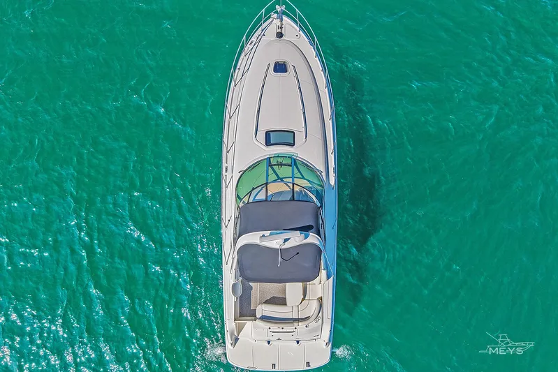  Yacht Photos Pics Top view of 2003 Sea Ray 420 Sundancer yacht on turquoise water.