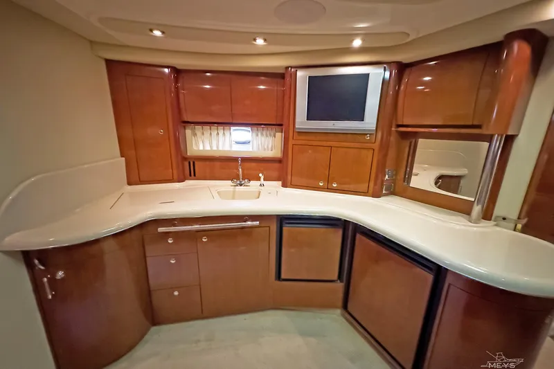  Yacht Photos Pics Luxurious 2003 Sea Ray 420 Sundancer yacht interior with elegant wood cabinetry and modern amenities.