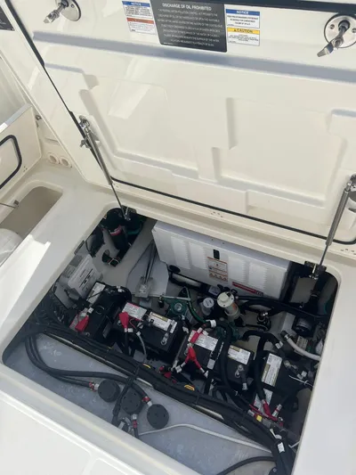  Yacht Photos Pics 2021 Boston Whaler 325 Conquest engine compartment with batteries and wiring.