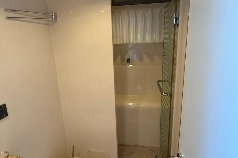 Wishlist Yacht Photos Pics Compact bathroom with shower and towel rack in 2009 Horizon 73 model.