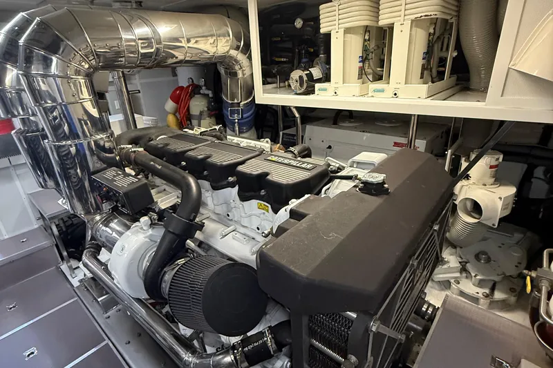 Wishlist Yacht Photos Pics Engine room of a 2009 Horizon 73 yacht, featuring a Caterpillar engine.