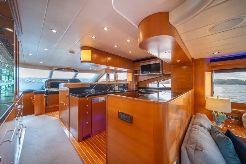 Wishlist Yacht Photos Pics Luxurious interior of 2009 Horizon 73 yacht with modern kitchen and scenic views.