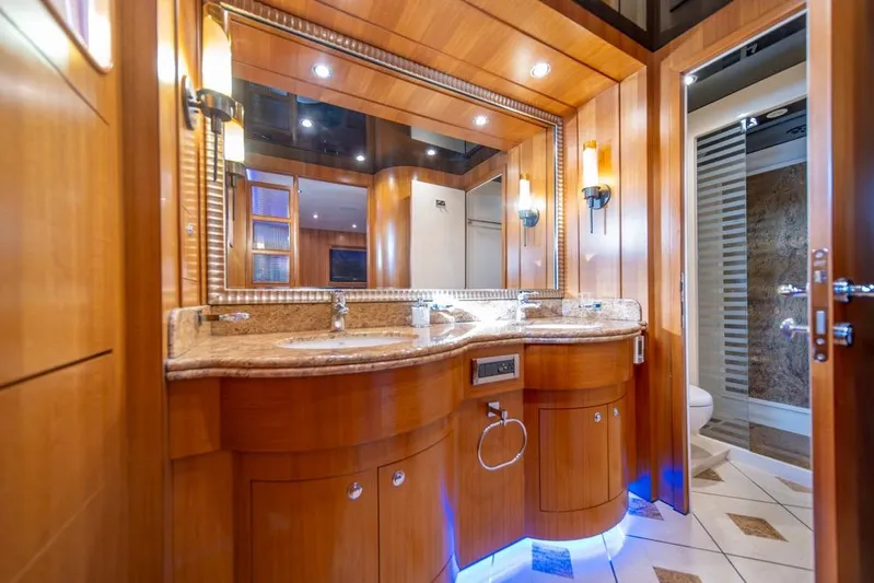 Wishlist Yacht Photos Pics Luxurious yacht bathroom with wooden cabinetry, marble countertop, and modern lighting, Horizon 73, 2009.