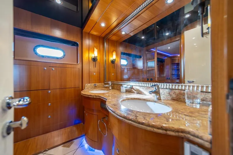 Wishlist Yacht Photos Pics Luxurious yacht bathroom with wooden cabinetry, granite countertop, and modern fixtures, Horizon 73, 2009.