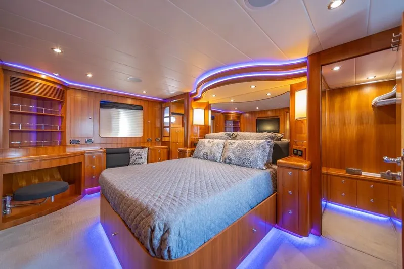 Wishlist Yacht Photos Pics Luxurious yacht bedroom with ambient lighting, wood paneling, and modern furnishings, Horizon 73, 2009.