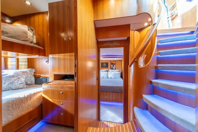 Wishlist Yacht Photos Pics Luxurious 2009 Horizon 73 yacht interior with wooden finishes and blue LED lighting.