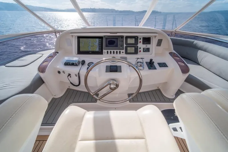 Wishlist Yacht Photos Pics Helm of 2009 Horizon 73 yacht with navigation controls and panoramic view.