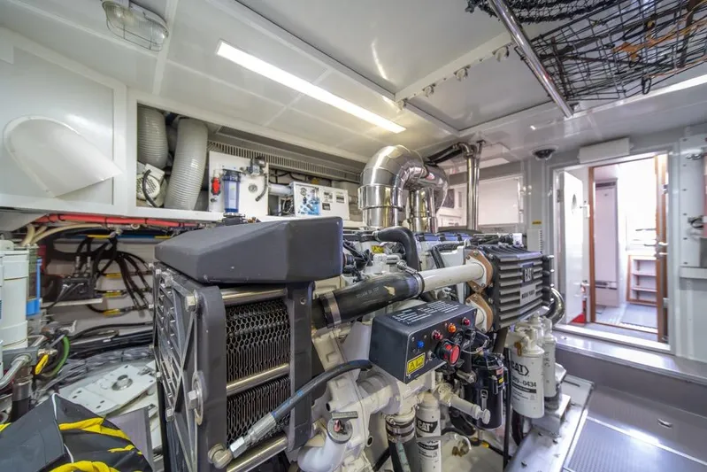 Wishlist Yacht Photos Pics Engine room of 2009 Horizon 73 yacht, showcasing machinery and equipment.