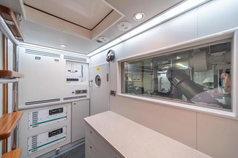 Wishlist Yacht Photos Pics Engine room of 2009 Horizon 73 yacht with control panels and machinery.