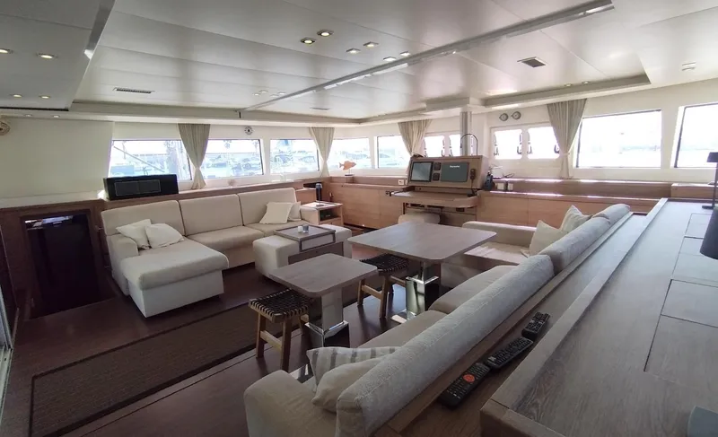 Jarana Yacht Photos Pics Luxurious interior of 2012 Lagoon 620 yacht with spacious seating and modern design.