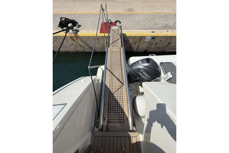  Yacht Photos Pics Boarding ramp on 2013 Ferretti Yachts 720, docked with Yamaha engine visible.