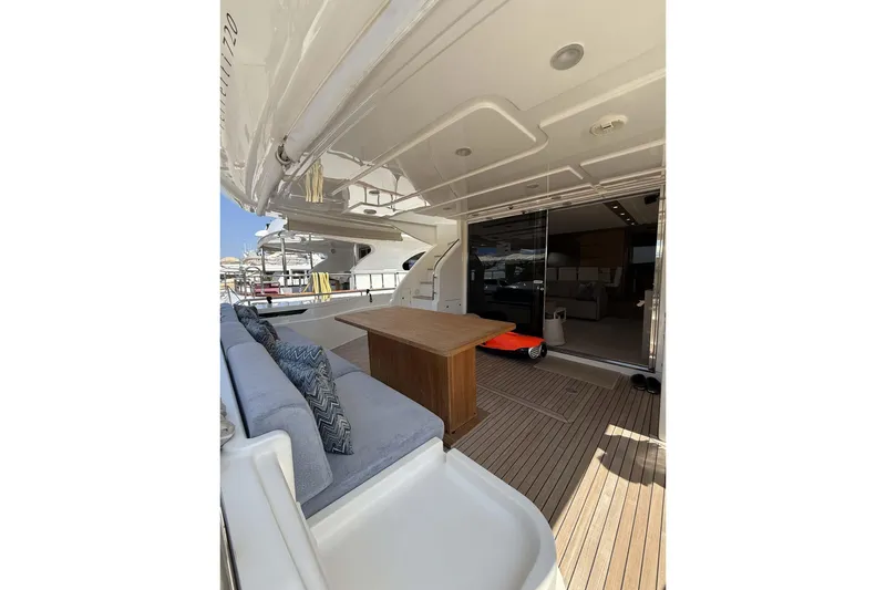  Yacht Photos Pics Ferretti Yachts 720, 2013 model, featuring elegant outdoor seating and wooden deck.