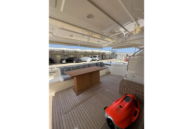  Yacht Photos Pics Luxurious 2013 Ferretti Yachts 720 deck with wooden flooring and seating area.