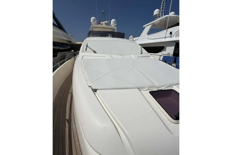  Yacht Photos Pics 2013 Ferretti Yachts 720, sleek deck view, docked alongside other luxury vessels.