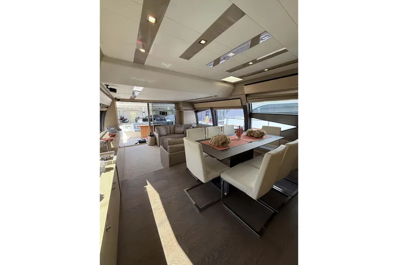  Yacht Photos Pics Luxurious interior of 2013 Ferretti Yachts 720, featuring elegant dining and seating areas.