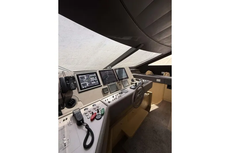  Yacht Photos Pics Control panel of 2013 Ferretti Yachts 720, featuring advanced navigation systems and controls.
