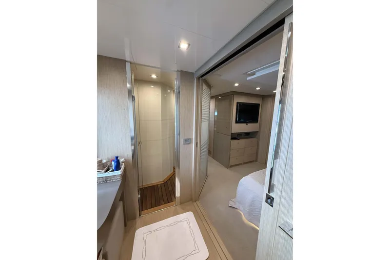  Yacht Photos Pics Luxurious interior of 2013 Ferretti Yachts 720, featuring modern bedroom and bathroom design.