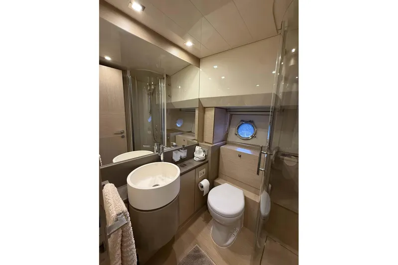  Yacht Photos Pics Luxurious bathroom in 2013 Ferretti Yachts 720, featuring modern fixtures and elegant design.