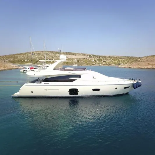  Yacht Photos Pics 2013 Ferretti Yachts 720 anchored in serene coastal waters.