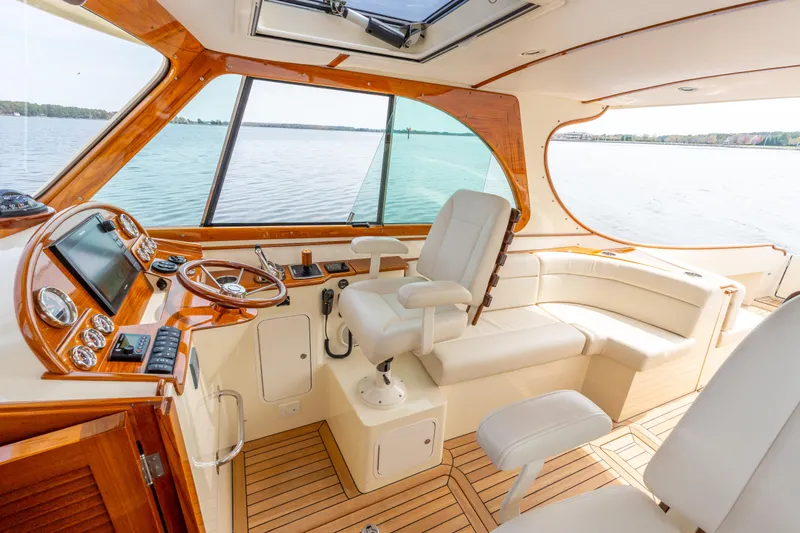 Just B Yacht Photos Pics Interior of 2018 Hinckley Picnic Boat MKII with elegant wood and leather design.