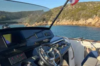 2020 Pardo Yachts 43 cockpit with scenic coastal view.