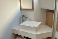 Modern bathroom interior on 2020 Pardo Yachts 43, featuring sleek sink and wooden cabinetry.