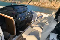 Cockpit of 2020 Pardo Yachts 43 with luxurious seating and scenic ocean view.