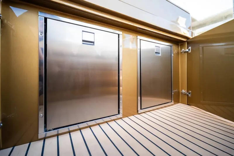  Yacht Photos Pics Stainless steel storage compartments on 2023 Midnight Express 43 Open boat deck.