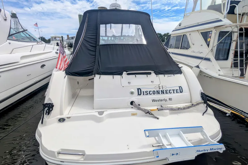  Yacht Photos Pics 2004 Sea Ray 340 Sundancer docked, featuring "Disconnected" name and Westerly, RI location.