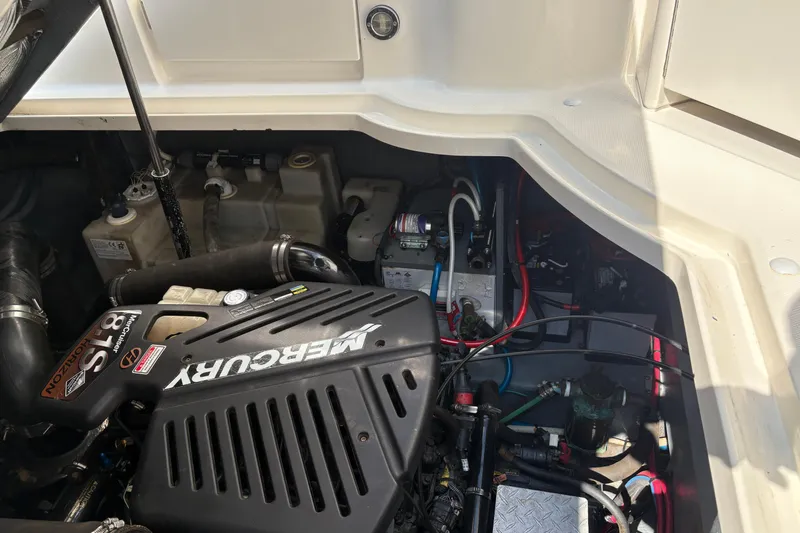  Yacht Photos Pics Engine compartment of 2004 Sea Ray 340 Sundancer with Mercury engine components.