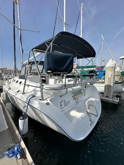  Yacht Photos Pics 2008 Hunter 38 sailboat docked in marina, featuring a sleek design and spacious deck.