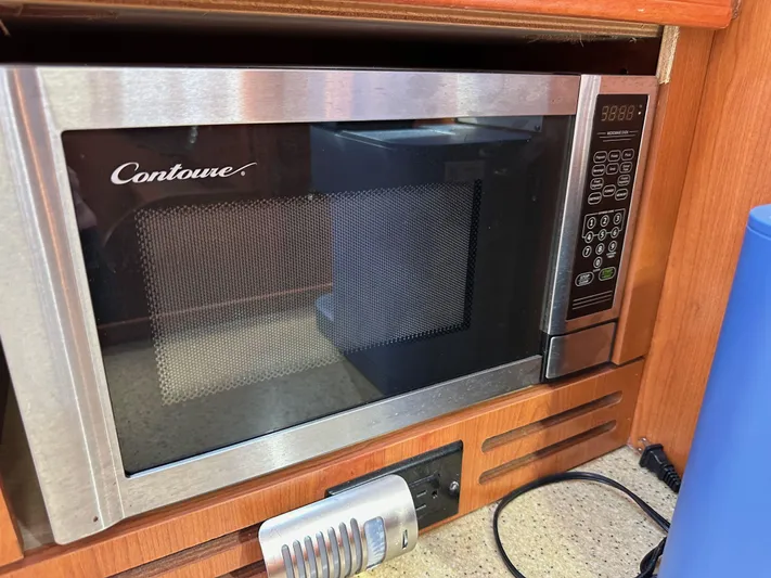  Yacht Photos Pics Microwave oven in a 2008 Hunter 38 yacht kitchen setup.