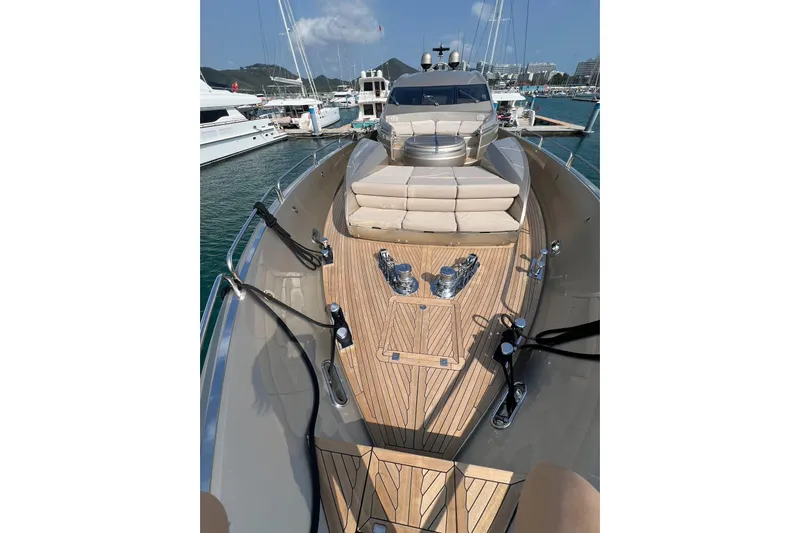  Yacht Photos Pics Luxurious 2010 Sunseeker Predator 108 yacht with sleek deck and plush seating in marina.