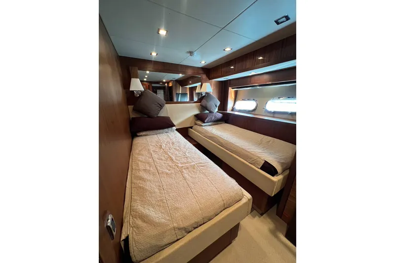  Yacht Photos Pics Luxurious twin cabin interior on 2010 Sunseeker Predator 108 yacht.