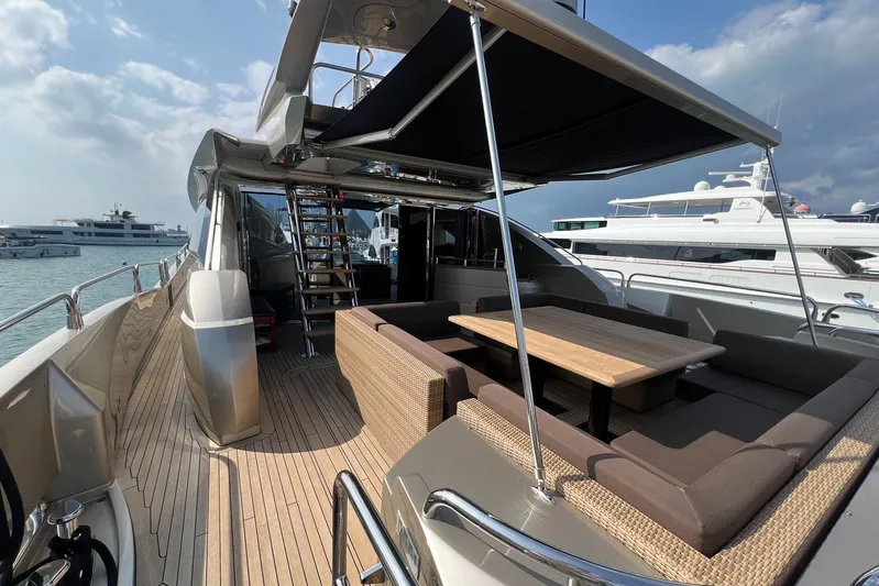  Yacht Photos Pics Luxurious 2010 Sunseeker Predator 108 yacht with spacious outdoor seating area.