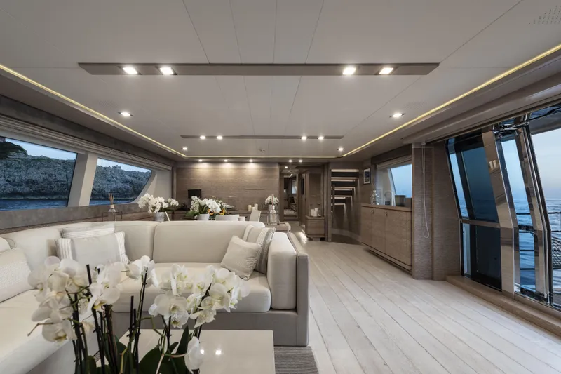  Yacht Photos Pics Luxurious interior of 2013 Custom Line Navetta 33 Crescendo yacht with elegant decor and ocean view.