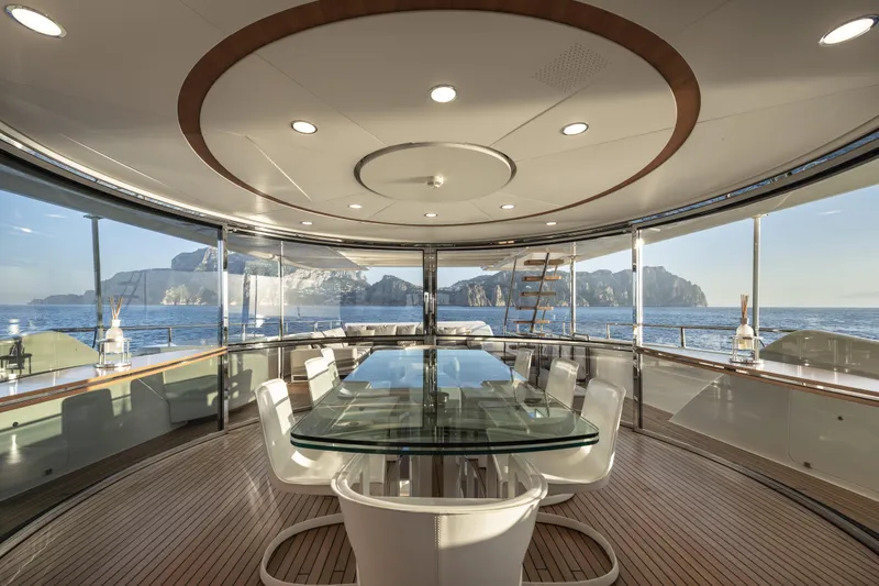  Yacht Photos Pics Luxurious yacht interior with glass table, panoramic ocean view, Custom Line Navetta 33 Crescendo 2013.
