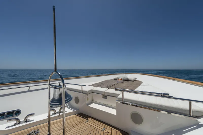  Yacht Photos Pics Luxurious 2013 Custom Line Navetta 33 Crescendo yacht deck with sunbathing area and ocean view.