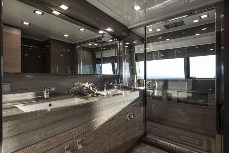  Yacht Photos Pics Luxurious bathroom on 2013 Custom Line Navetta 33 Crescendo yacht, featuring modern fixtures and ocean view.