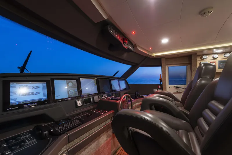  Yacht Photos Pics Luxurious 2013 Custom Line Navetta 33 Crescendo yacht cockpit with advanced navigation systems.