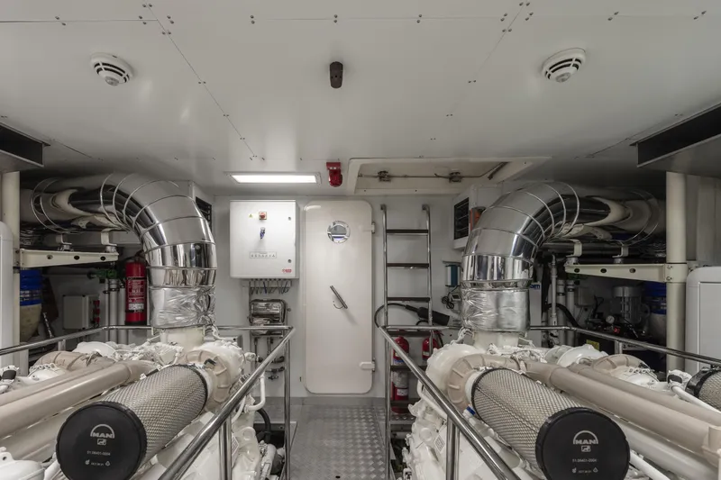  Yacht Photos Pics Engine room of 2013 Custom Line Navetta 33 Crescendo yacht, featuring dual engines and ventilation system.