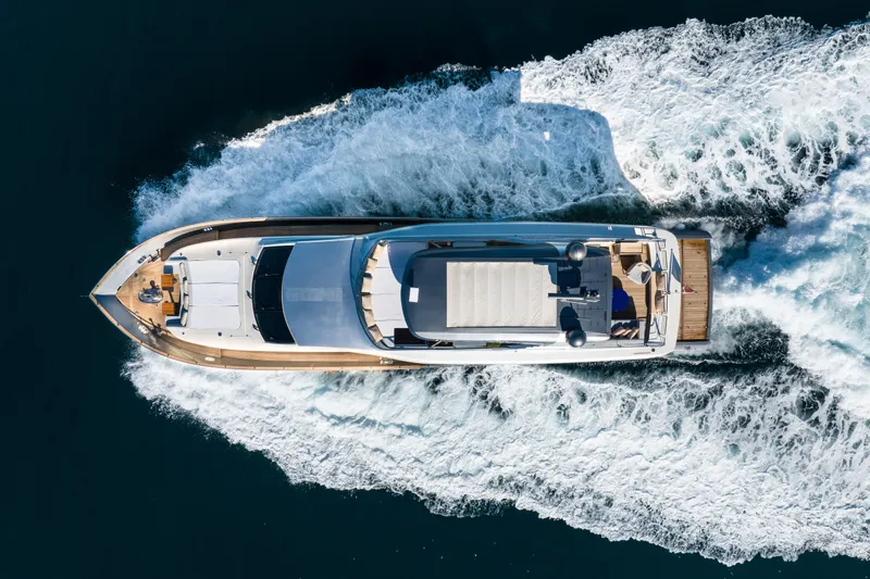 Mad Day Yacht Photos Pics Aerial view of 2018 Canados 888 Evolution yacht cruising on the water.