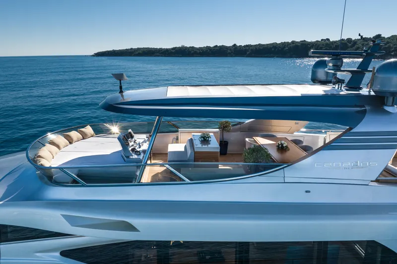 Mad Day Yacht Photos Pics Luxurious 2018 Canados 888 Evolution yacht cruising on serene blue waters.