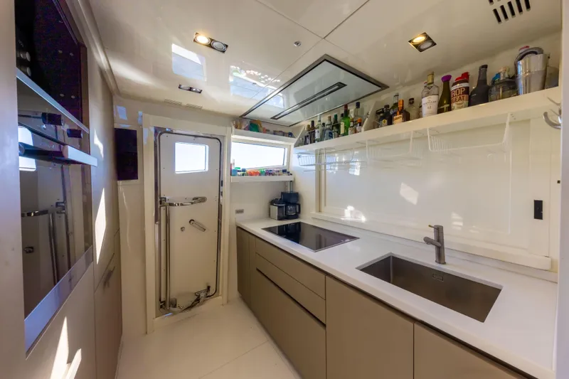 Mad Day Yacht Photos Pics MAD DAY - Galley with pop up main salon partition